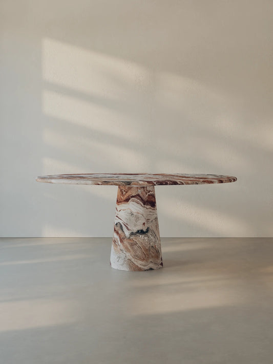 Leila Table in Rosso Orobico marble with a monolithic cone base