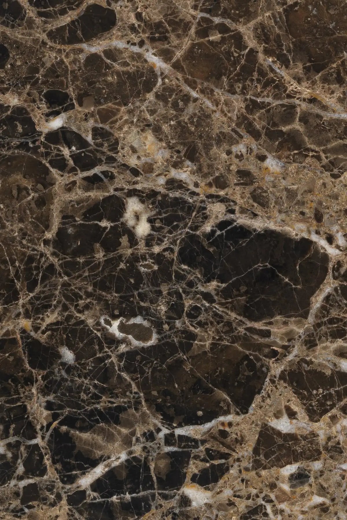 Dark Emperador marble with deep brown tones and fine light veining